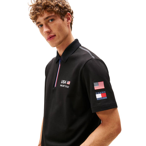 Polo Uomo a tinta unita, con mezza zip e bandiere applicate sulla manica